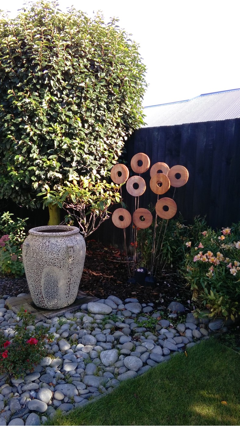 Wooden Wind Wands in the garden