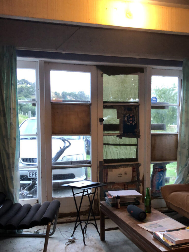 Banks Peninsula bach conversion recycled door installation - interior, before