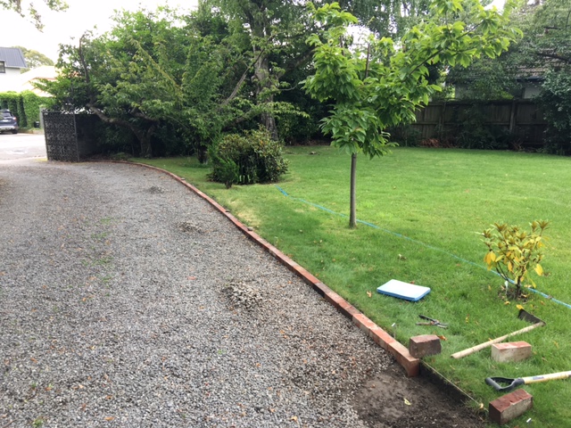 Recycled brick driveway lawn border measuring