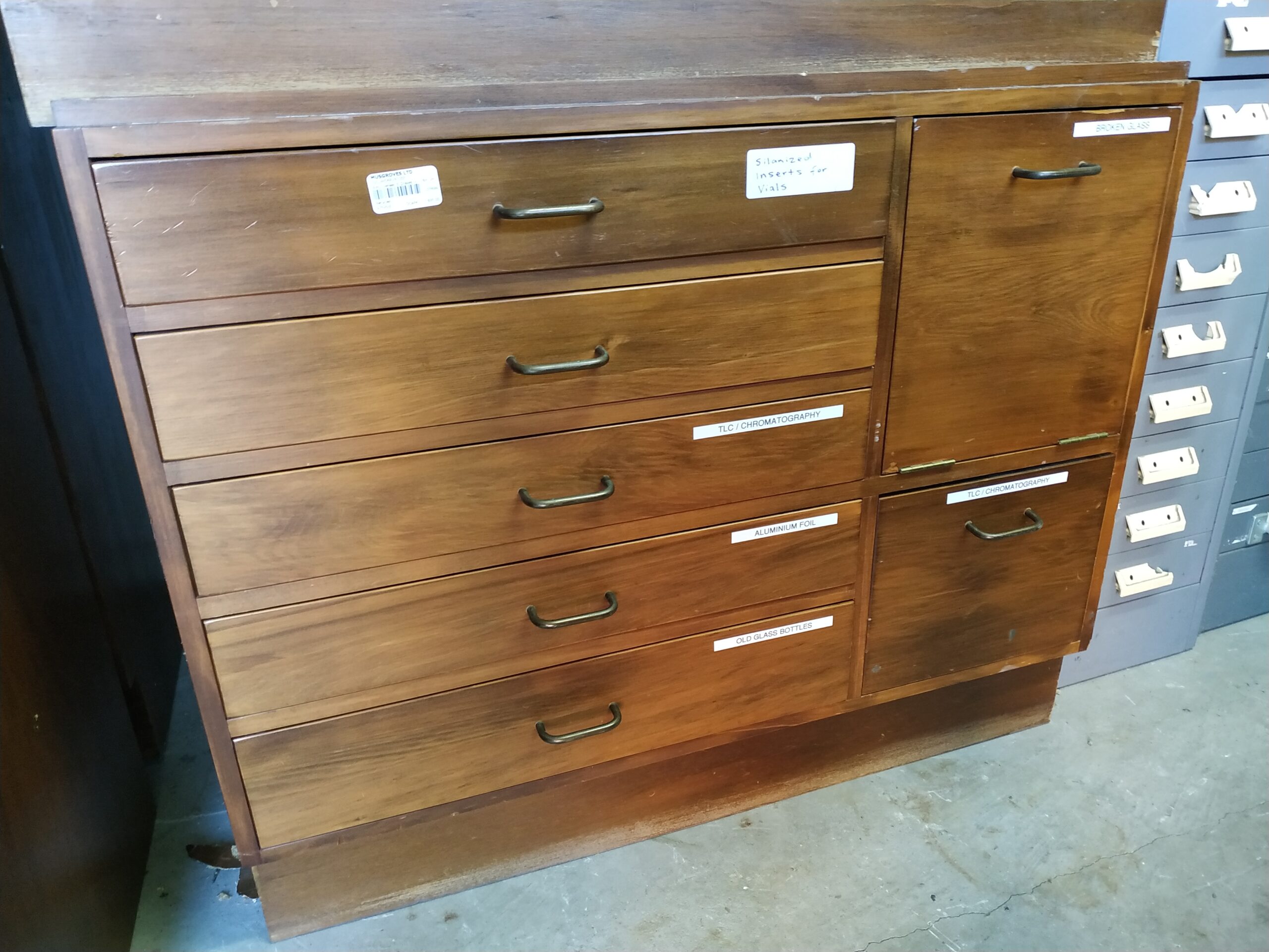 107699-Rimu veneer cabinet Rimu Veneer 6 Drawer & 1 Bin Unit