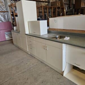 White Galley Style Kitchen with Green Bench Top